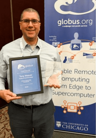 Tony Weaver from F&M receiving the Globus Community Award for 2026